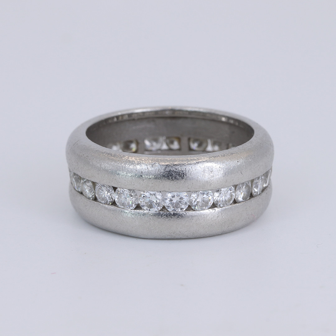 PLATINUM DIAMOND SET BAND RING.