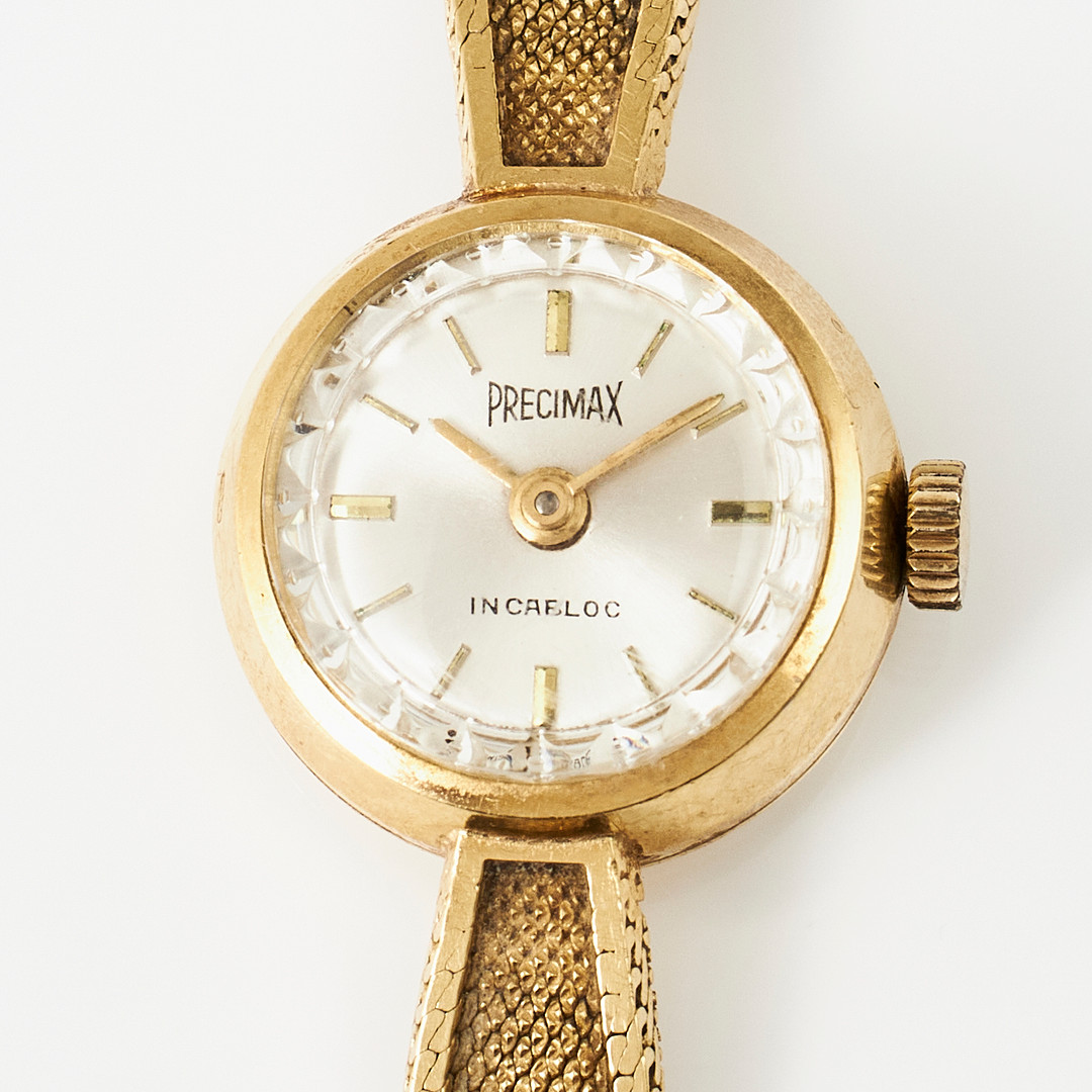 PRECIMAX, armbandsur, manuell, plexiglas, integrerad länk, 18 k guld, med svensk importstämpel, 1960-tal.