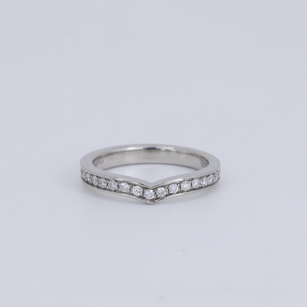 PLATINUM DIAMOND SET WISHBONE RING.