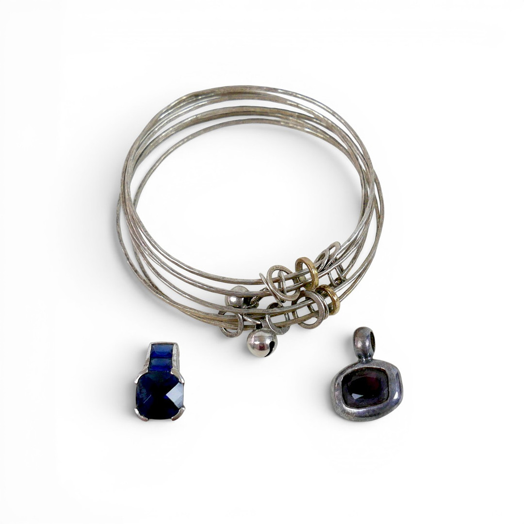 TWO 925 SILVER PENDANTS SET WITH HARDSTONES.