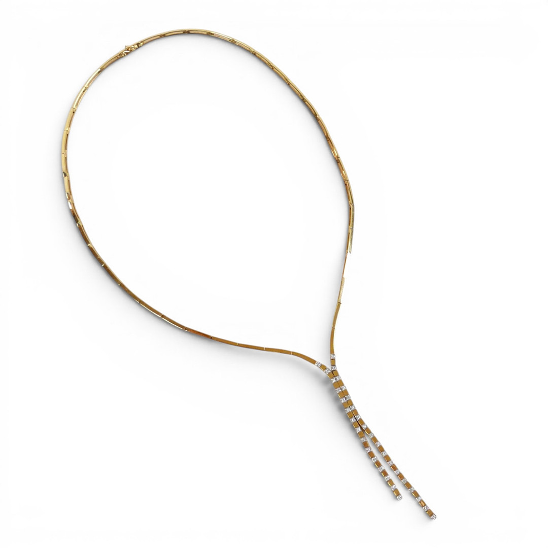 AN 18CT AND DIAMOND NECKLACE.