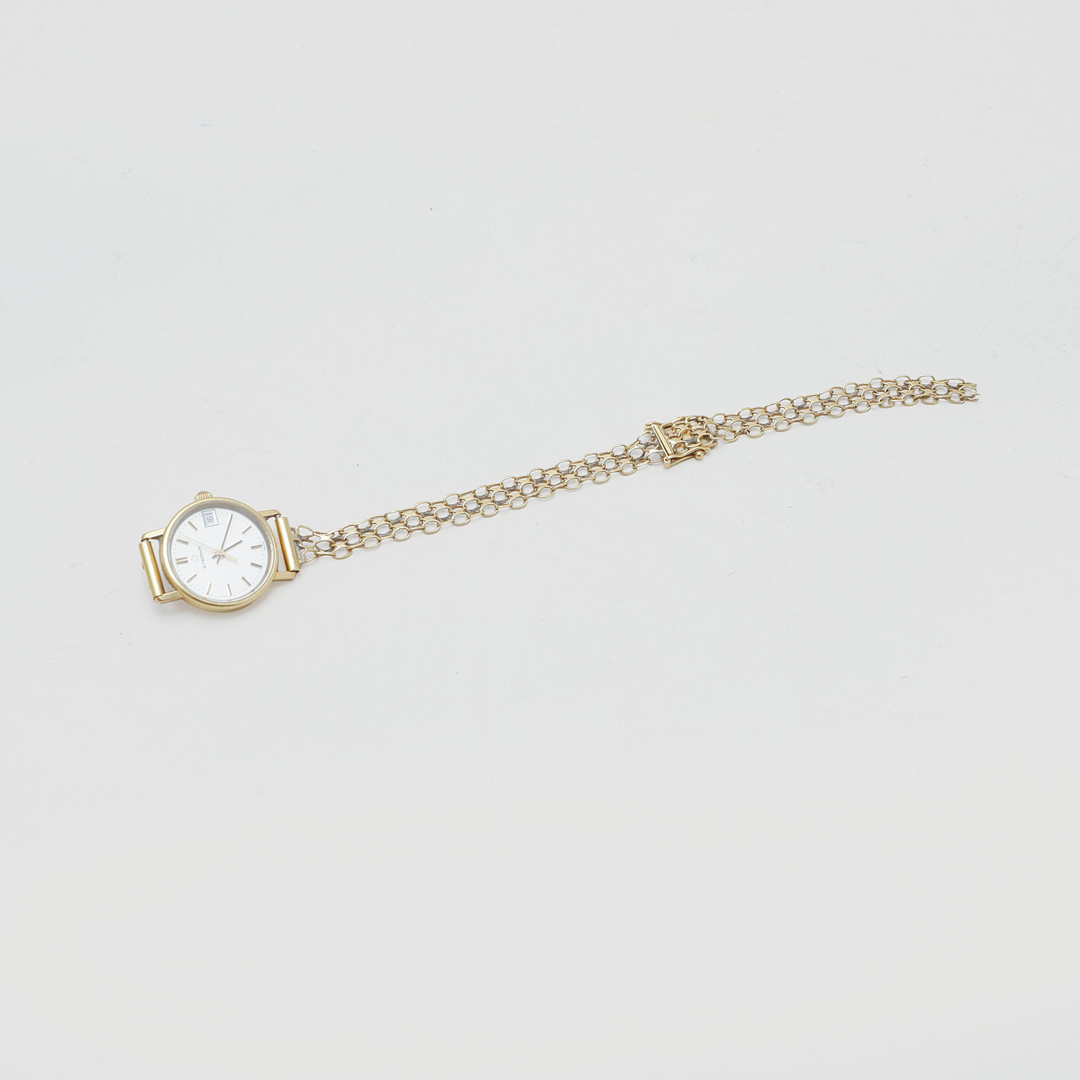 DAMARMBANDSUR, Eterna, 18k med länk i 18k, vikt ca 15,5 gram.