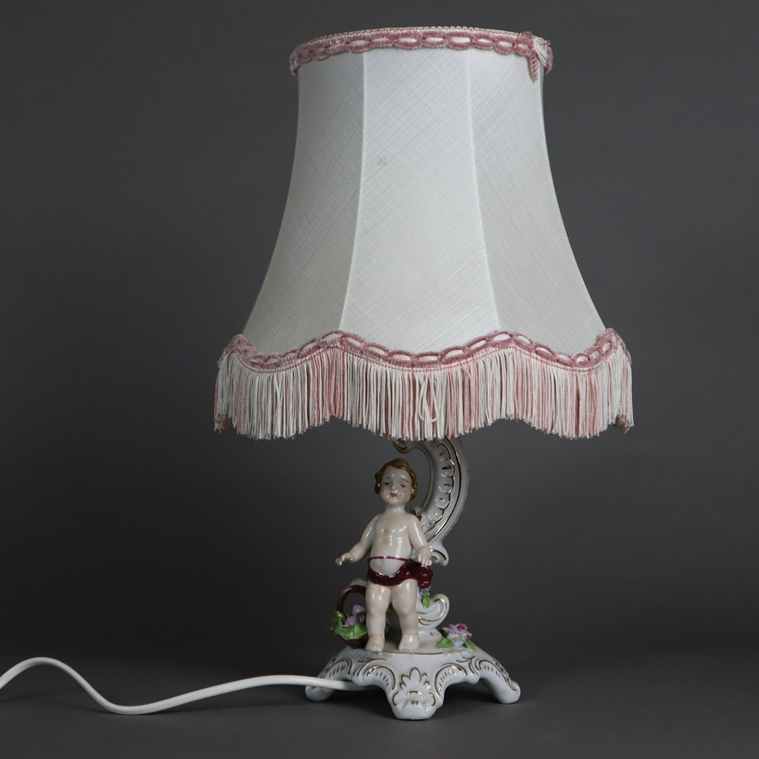 PORZELLANLAMPE MIT PUTTO - Karl Kette, Küps, Deutschland.