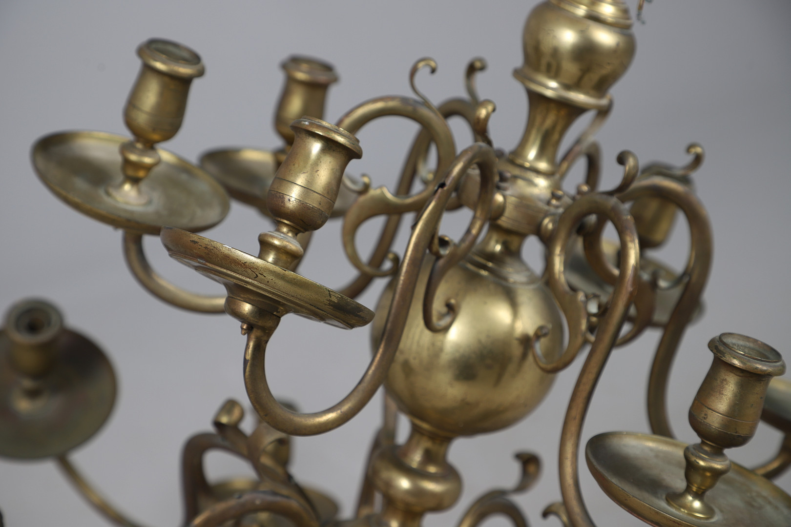 DECORATIVE DUTCH STYLE BRASS TWO-TIER TWELVE-LIGHT CHANDELIER.