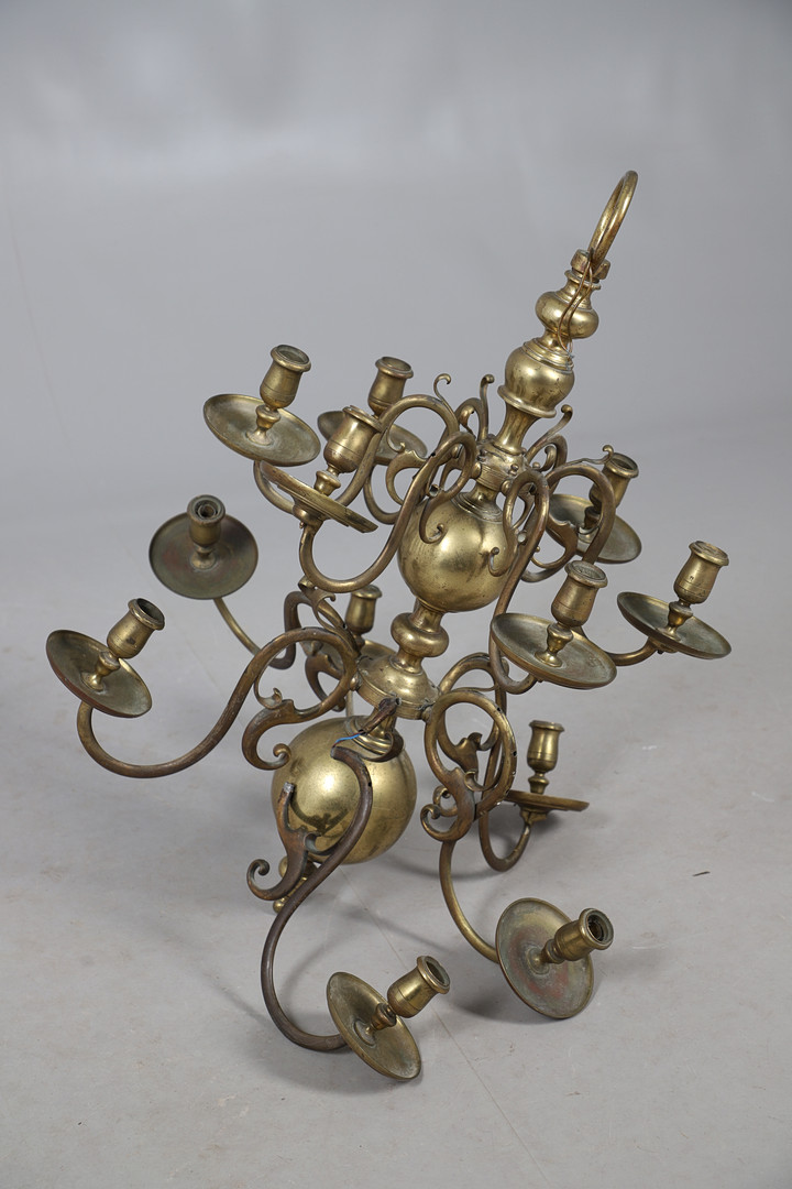 DECORATIVE DUTCH STYLE BRASS TWO-TIER TWELVE-LIGHT CHANDELIER.