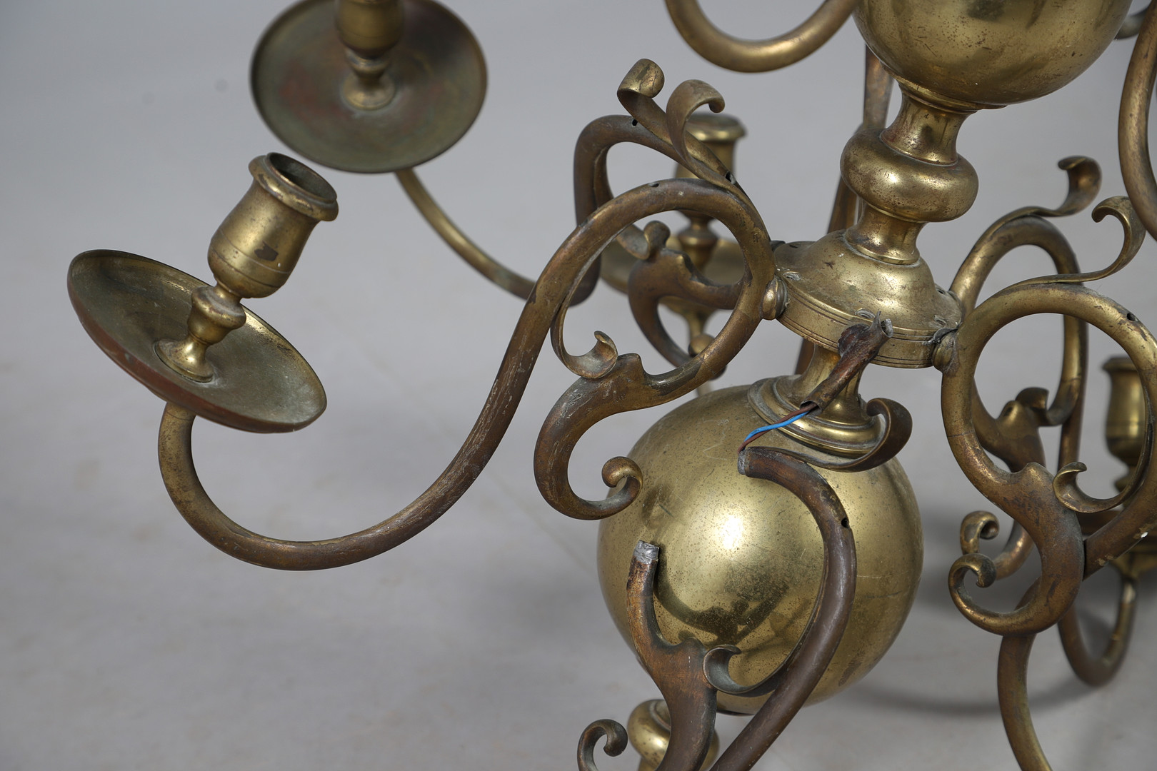 DECORATIVE DUTCH STYLE BRASS TWO-TIER TWELVE-LIGHT CHANDELIER.