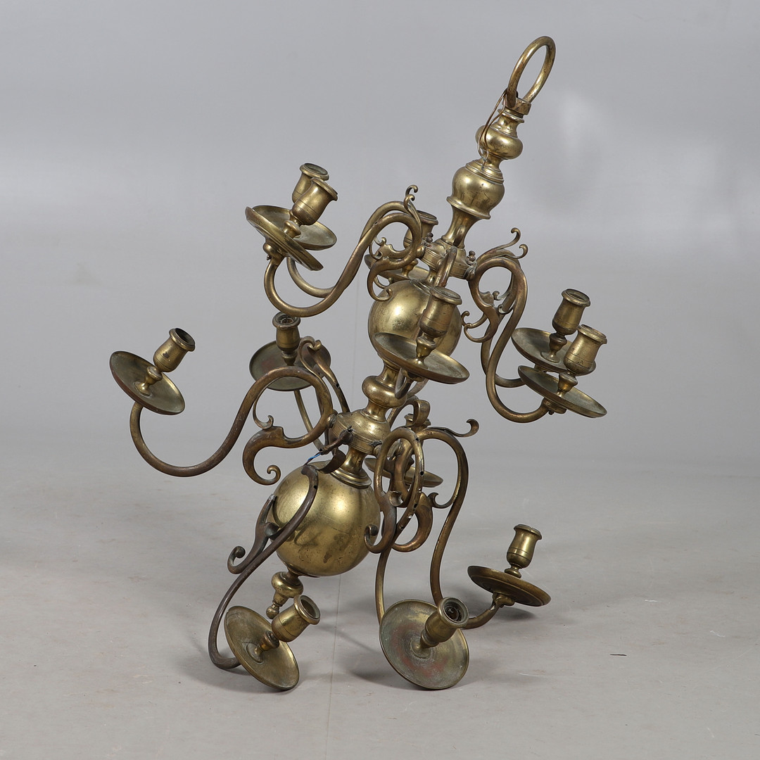 DECORATIVE DUTCH STYLE BRASS TWO-TIER TWELVE-LIGHT CHANDELIER.