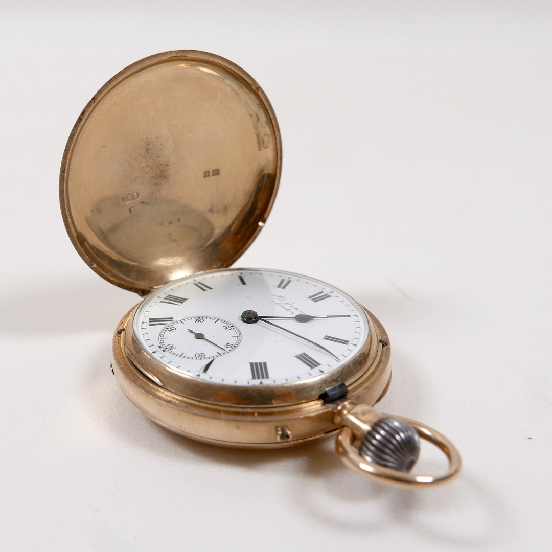 AN 18CT GOLD CASED POCKET WATCH.