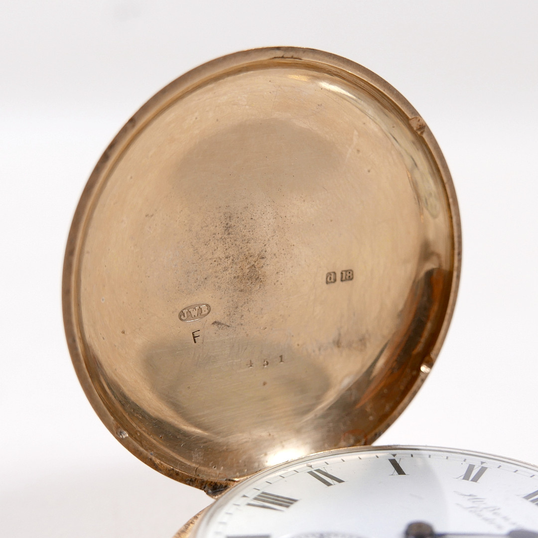 AN 18CT GOLD CASED POCKET WATCH.