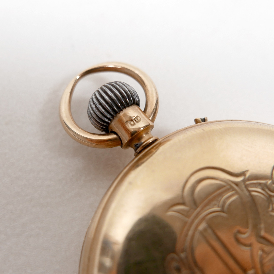 AN 18CT GOLD CASED POCKET WATCH.