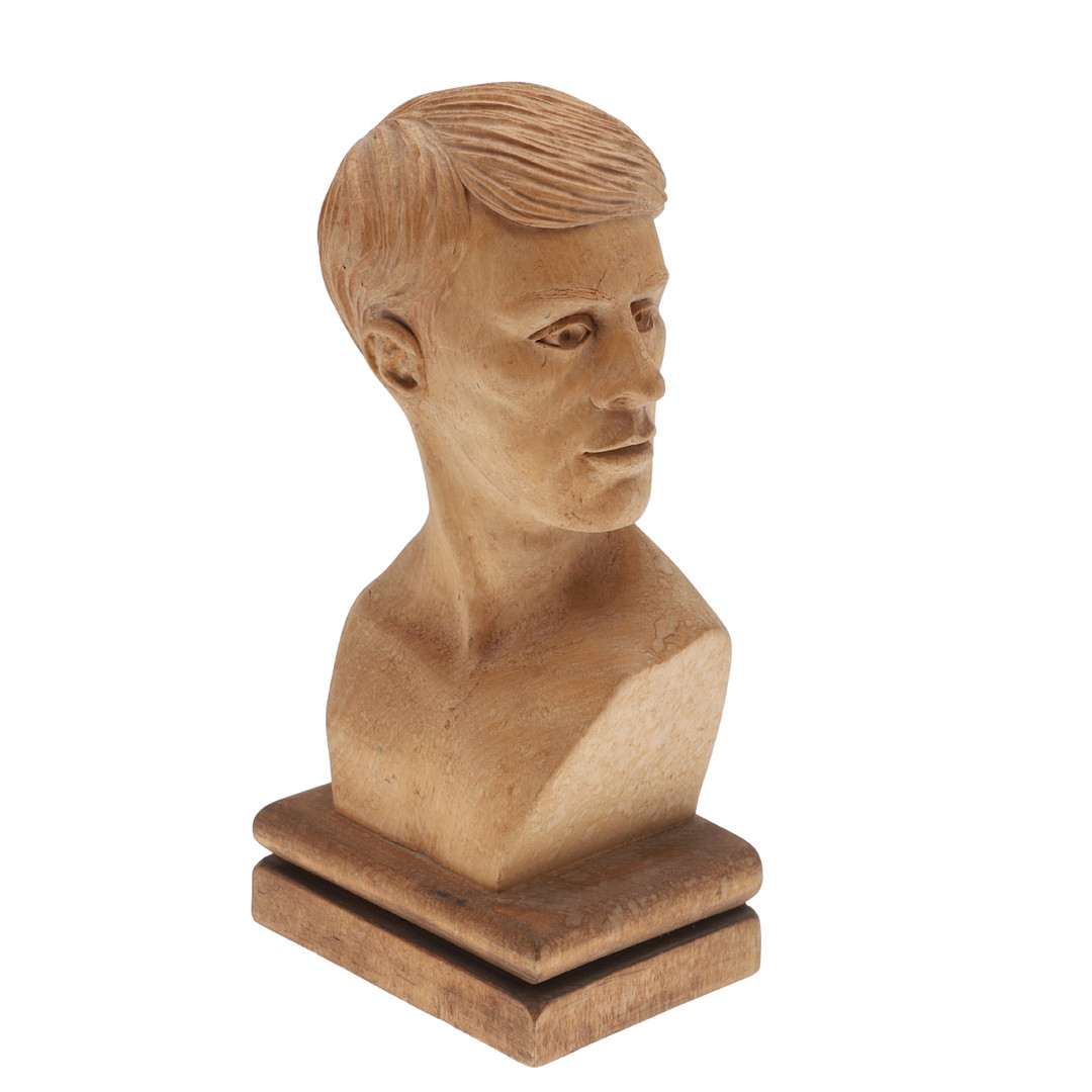 A MID-20TH CENTURY ARTS & CRAFTS CARVED OAK BUST OF A YOUNG GENTLEMAN.