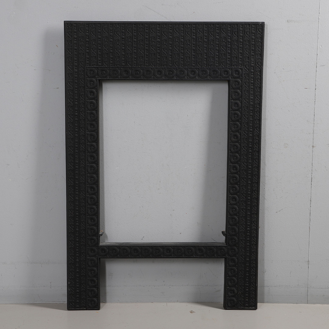 THOMAS JECKYLL (1827-1881) FOR BARNARD, BISHOP & BARNARD. AN AESTHETIC MOVEMENT CAST IRON FIRE INSERT.