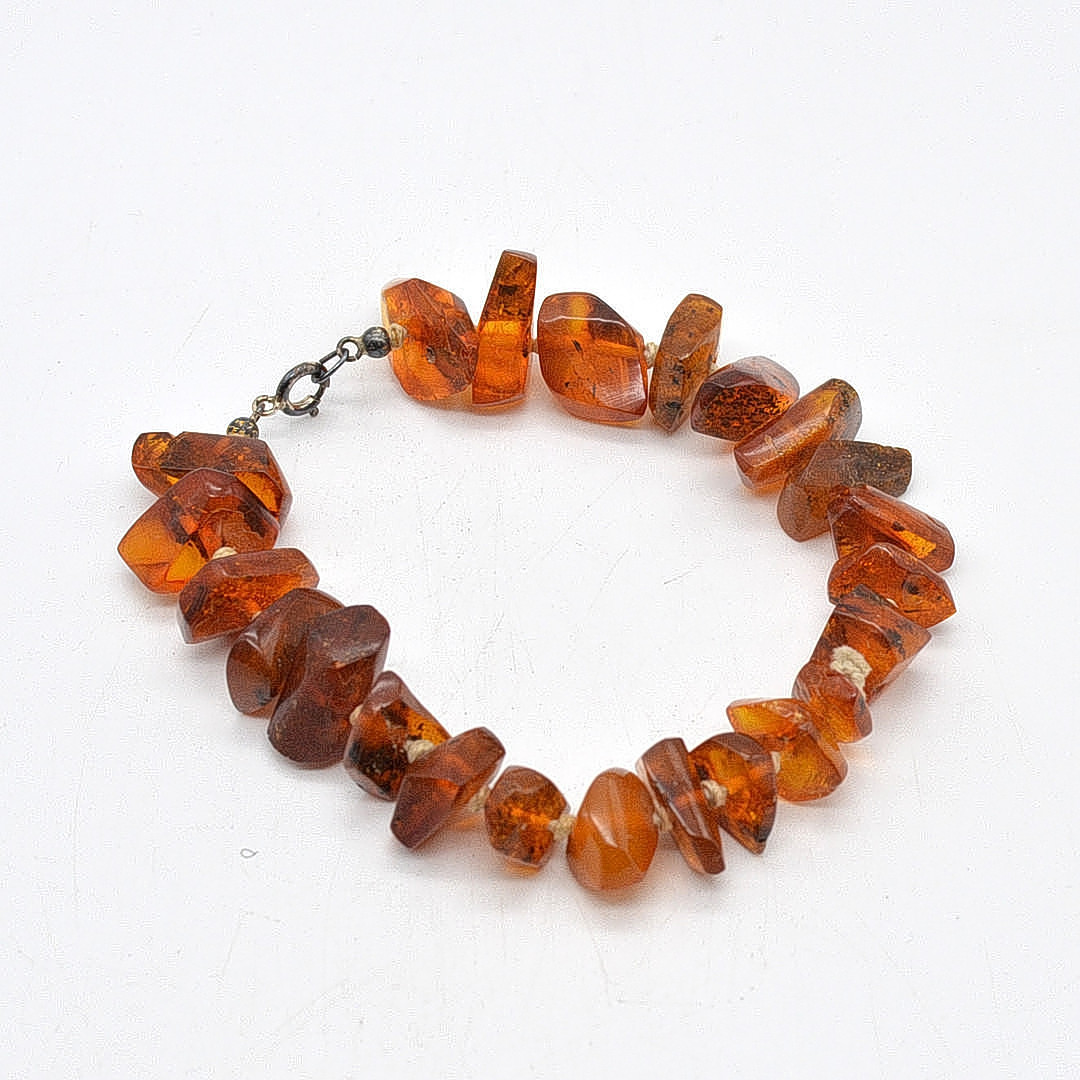 BUTTERSCOTCH BERNSTEIN ARMBAND MIT VERSCHLUSS, VINTAGE, CA. 20CM.