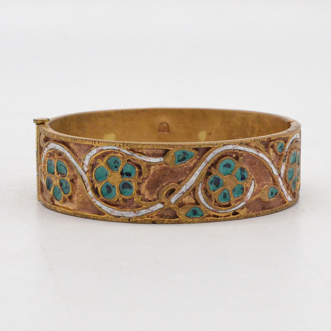EMAILLE-ARMREIF, MESSING, ORNAMENTDEKOR, VERGOLDET, UM 1950.