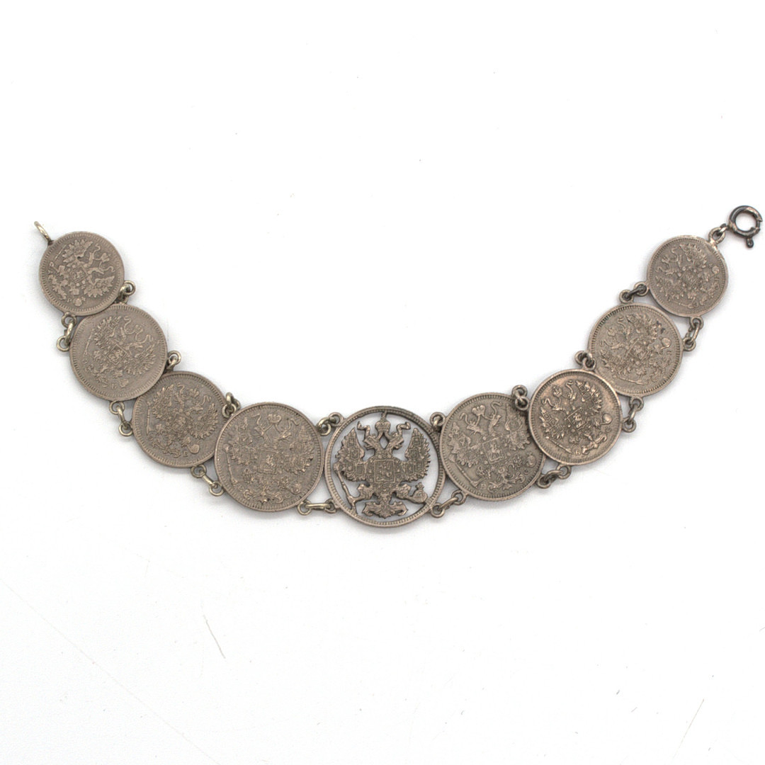 ANTIKES RUSSISCHES MÜNZ SILBER ARMBAND, MITTIG DOPPELKOPFADLER, HANDARBEIT, RUSSLAND UM CA. 1914.