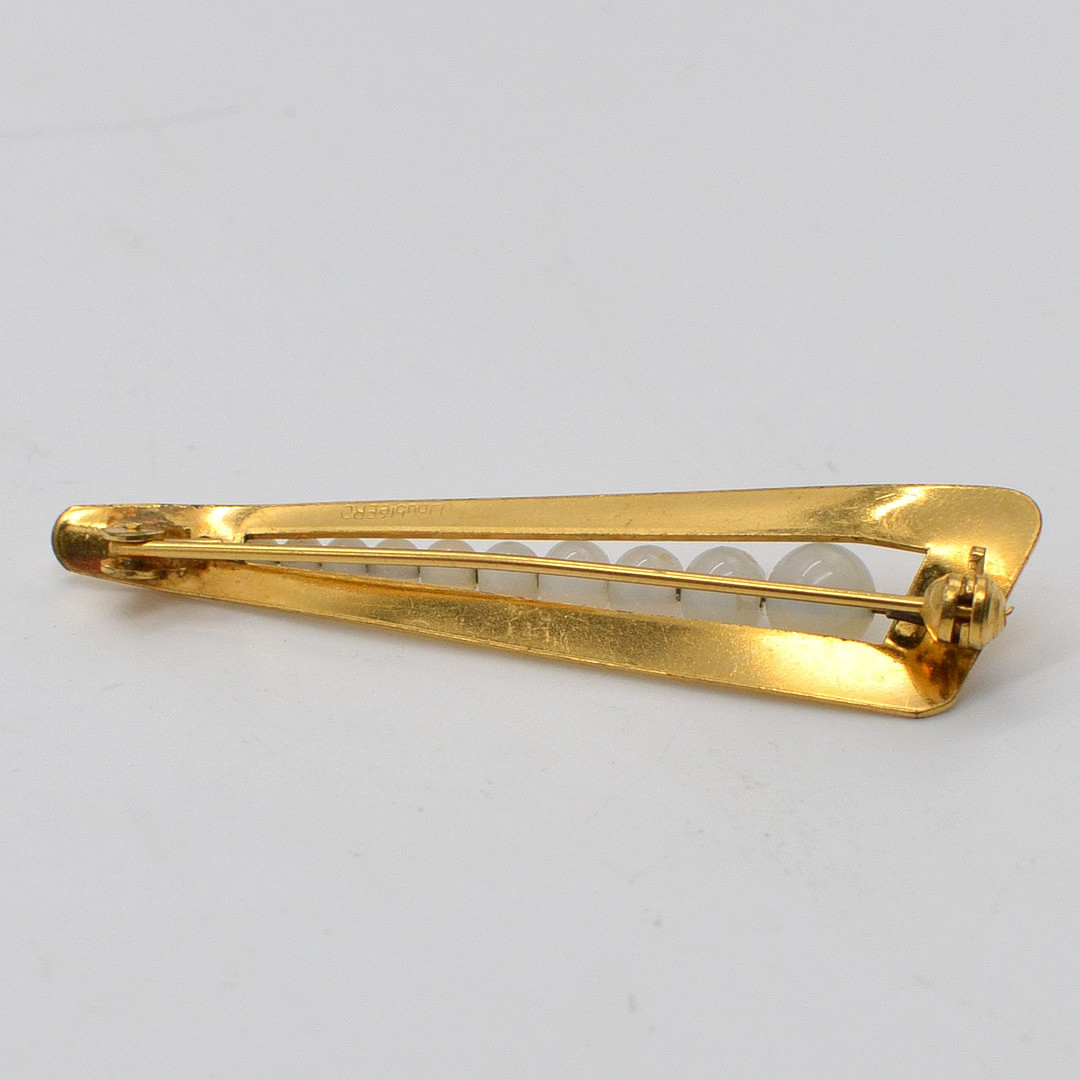 DESIGNERBROSCHE MIT MONSTEINPERLEN, "ERD", GOLD DOUBLÉ FASSUNG, UM 1950.