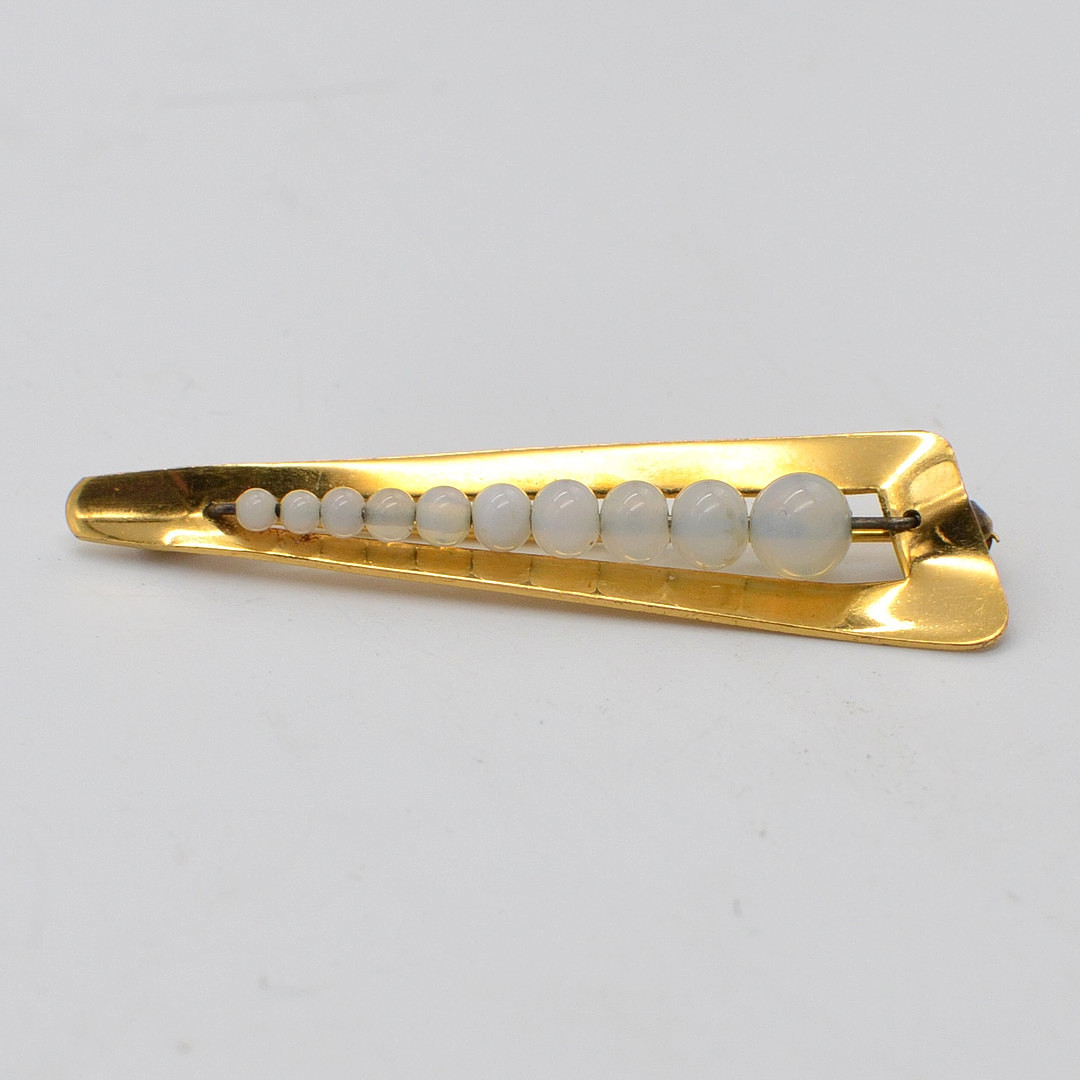 DESIGNERBROSCHE MIT MONSTEINPERLEN, "ERD", GOLD DOUBLÉ FASSUNG, UM 1950.