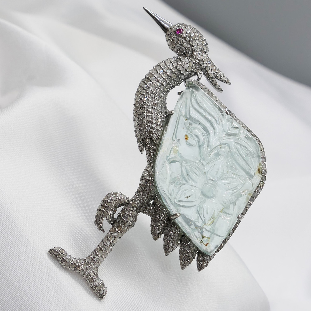 EXOTIC AQUAMARINE bird brooch.