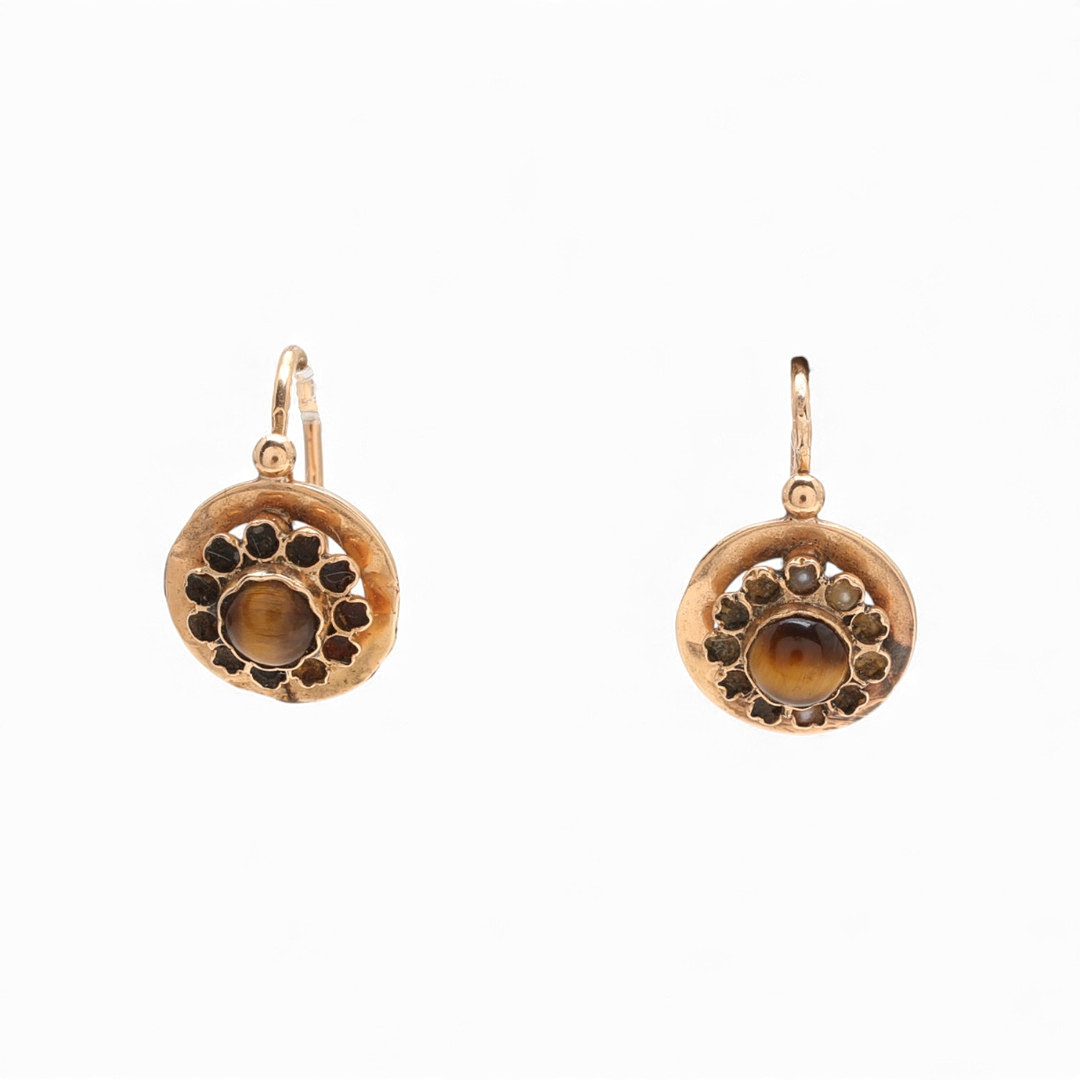 Gold and gemstones earrings, early 20th Century.