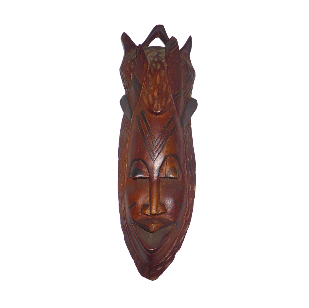 GESCHNITZTE WANDMASKE AUS HOLZ.