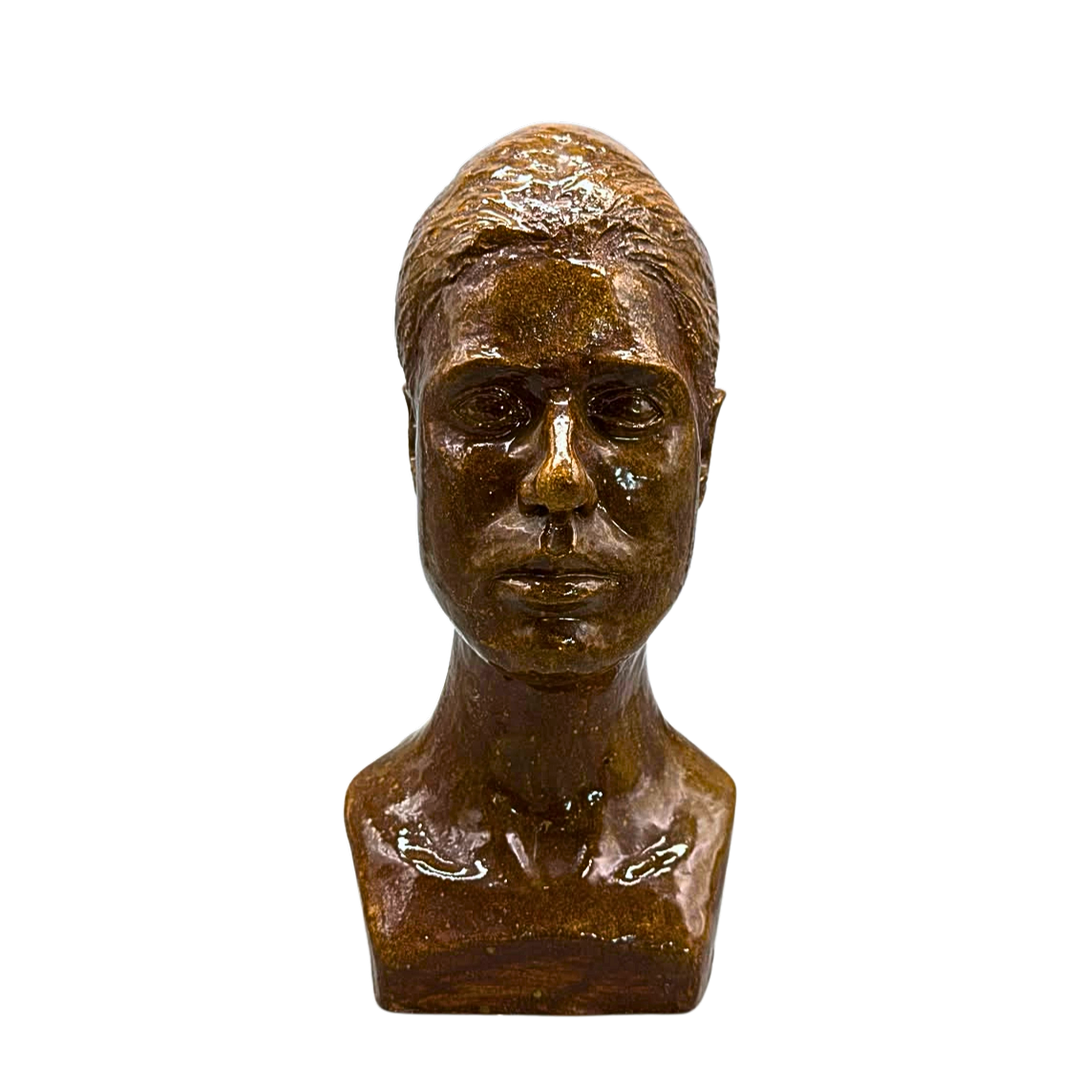 SCHEURER. GLASIERTE TONSKULPTUR EINER FRAUENBÜSTE, AUS DEM JAHR 1977.