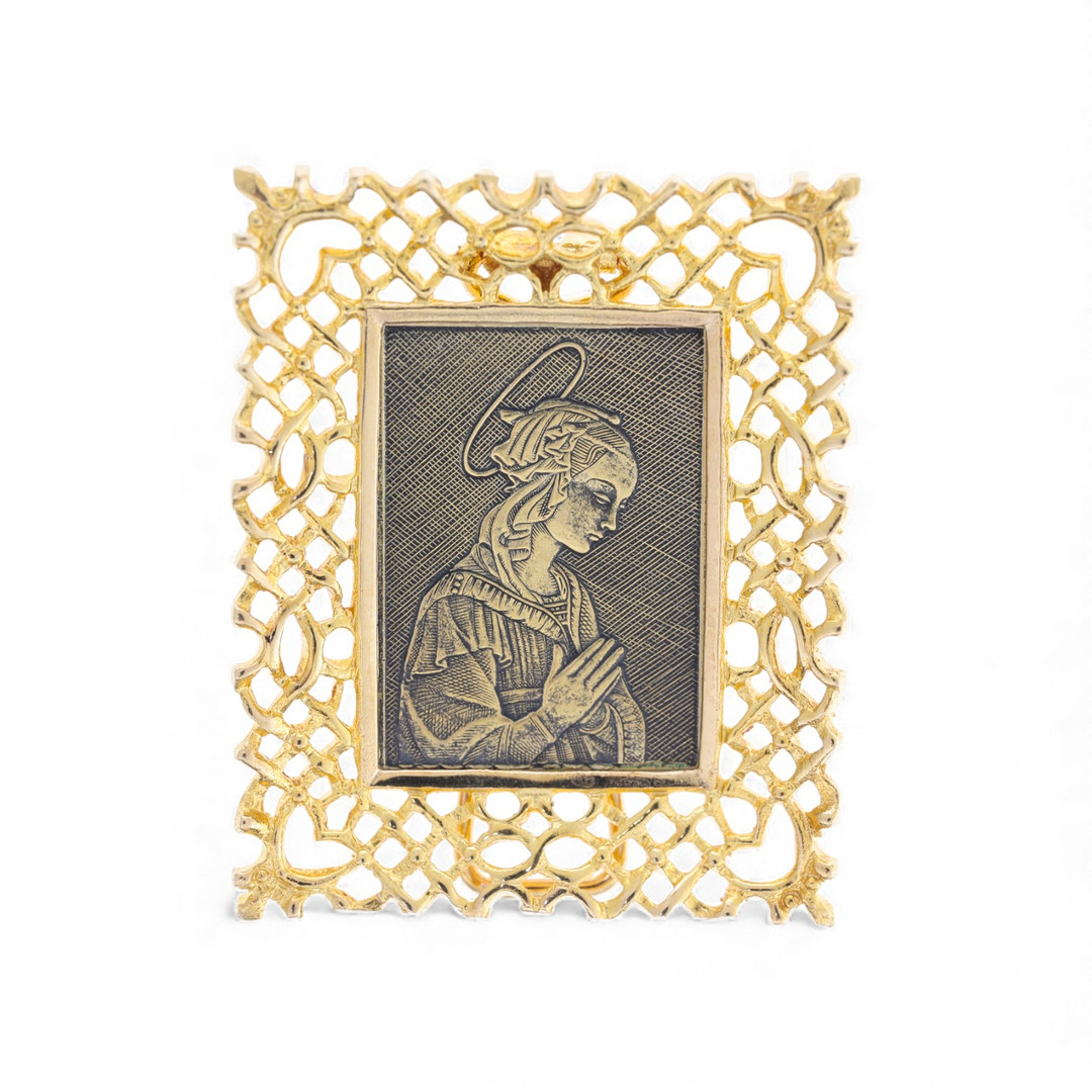 Table devotional medal in gold.