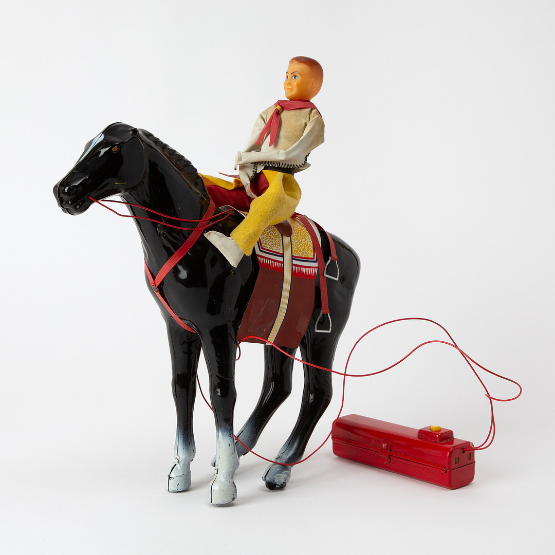 CRAGSTAN. "Galloping Horse & Rider", fjärrstyrd plåtleksak, Japan, 1900-talets mitt.