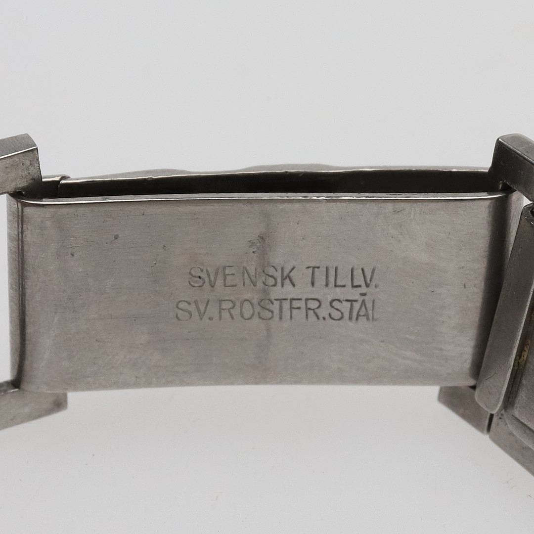 ARMBANDSUR. Nickel, 15 jewels, "Trench-watch" 1900-talets första halva.