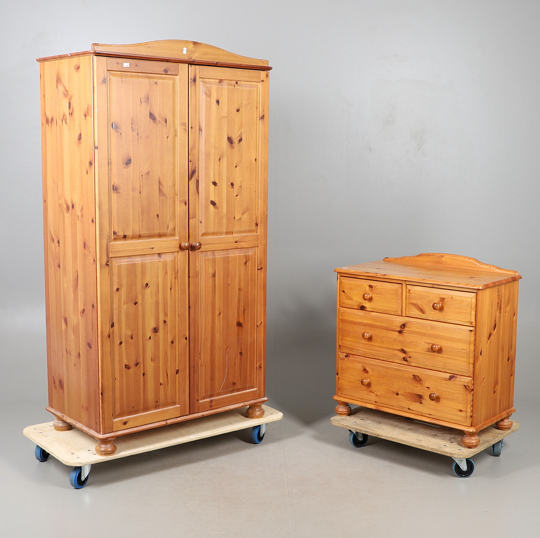 A MODERN PINE CHEST OF DRAWERS AND A TWO DOOR WARDROBE.