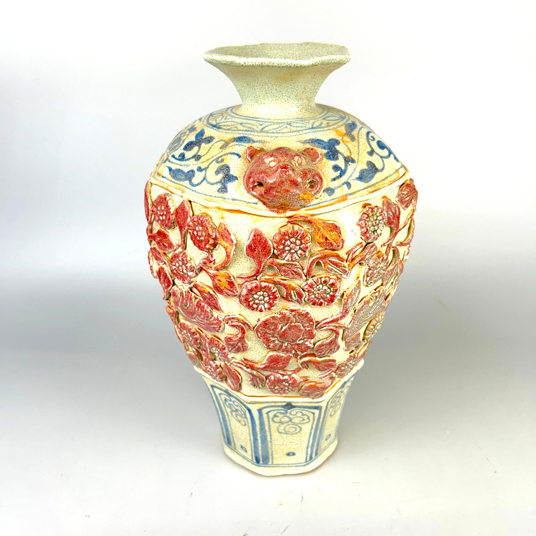 CHINESE RELIEF DECORATED VASE.