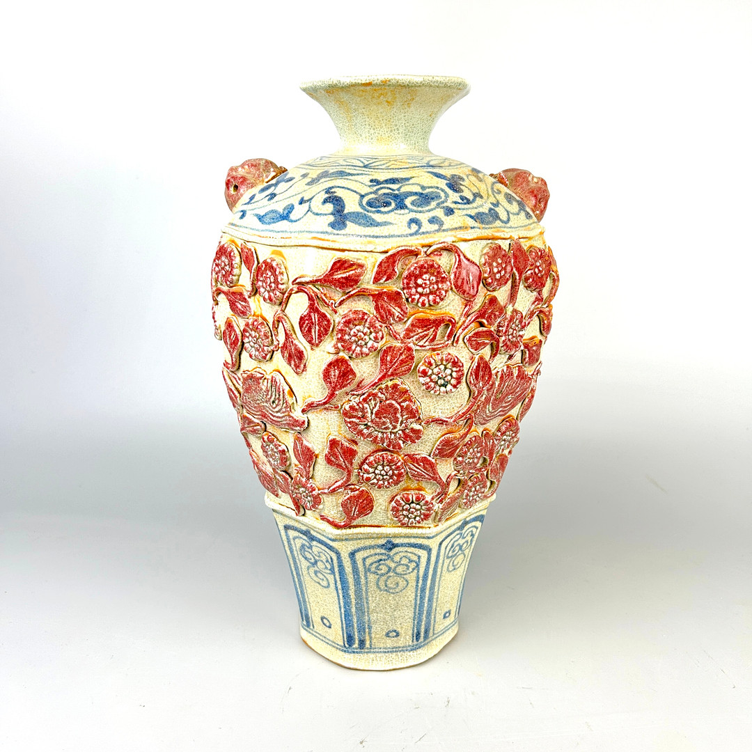 CHINESE RELIEF DECORATED VASE.