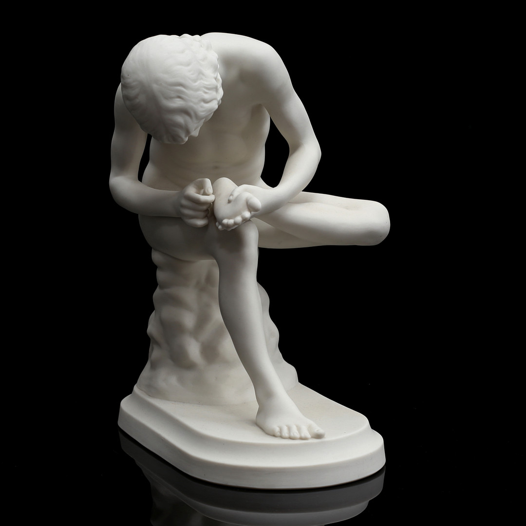 GUSTAF ERIKSSON. EFTER. (1849-1924) Skulptur, "Gosse med törntagg", parian, Gustavsberg, tidigt 1900-tal.