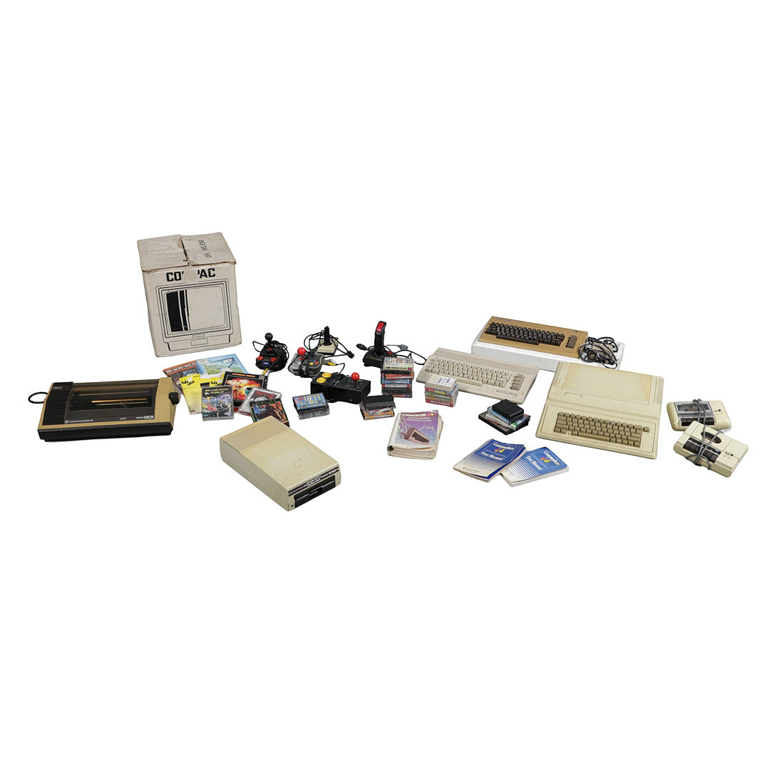 TWO COMMODORE 64 PERSONAL COMPUTERS, VARIOUS GAMES AND ACCESSORIES (QTY).