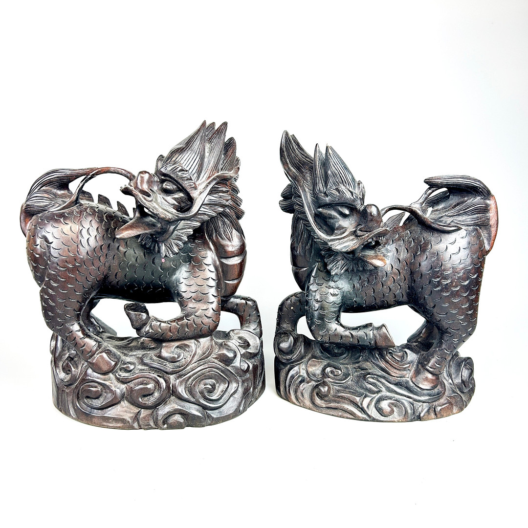 CARVED WOOD DRAGONS.