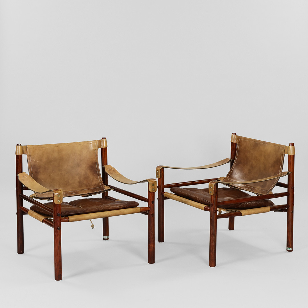 ARNE NORELL. "Sirocco", par lænestole af palisander og læder, Norell Möbler, Sverige, formgivet 1964 (2).