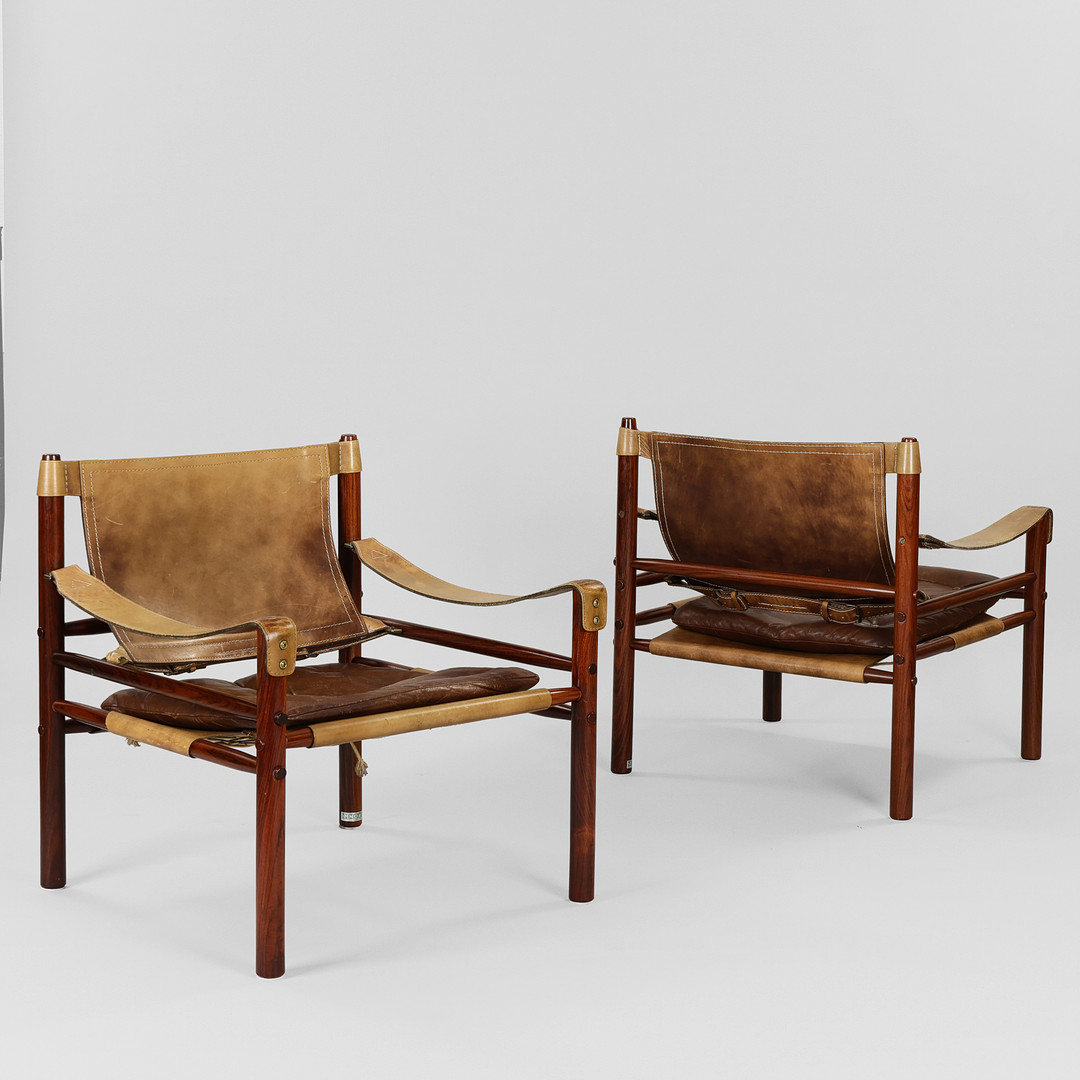 ARNE NORELL. "Sirocco", par lænestole af palisander og læder, Norell Möbler, Sverige, formgivet 1964 (2).