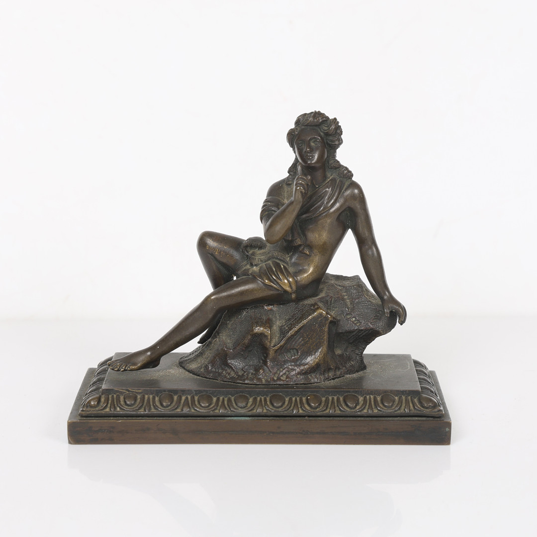 A REGENCY STYLE BRONZE FIGURE.