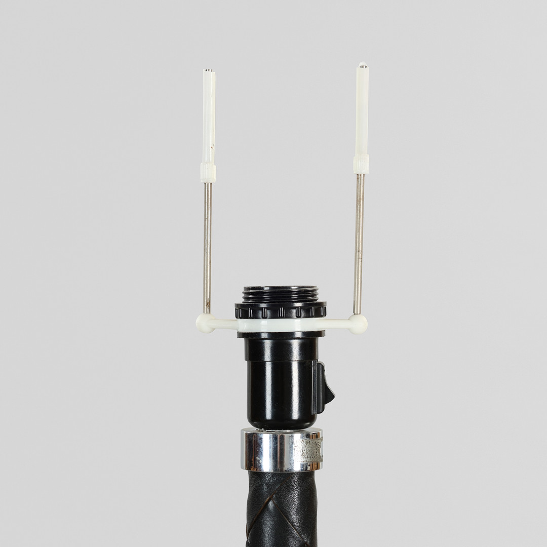 JO HAMMERBORG. “Flet”, standerlampe af aluminium og flettet sort læder, Fog & Mørup, Danmark, 1960'erne.