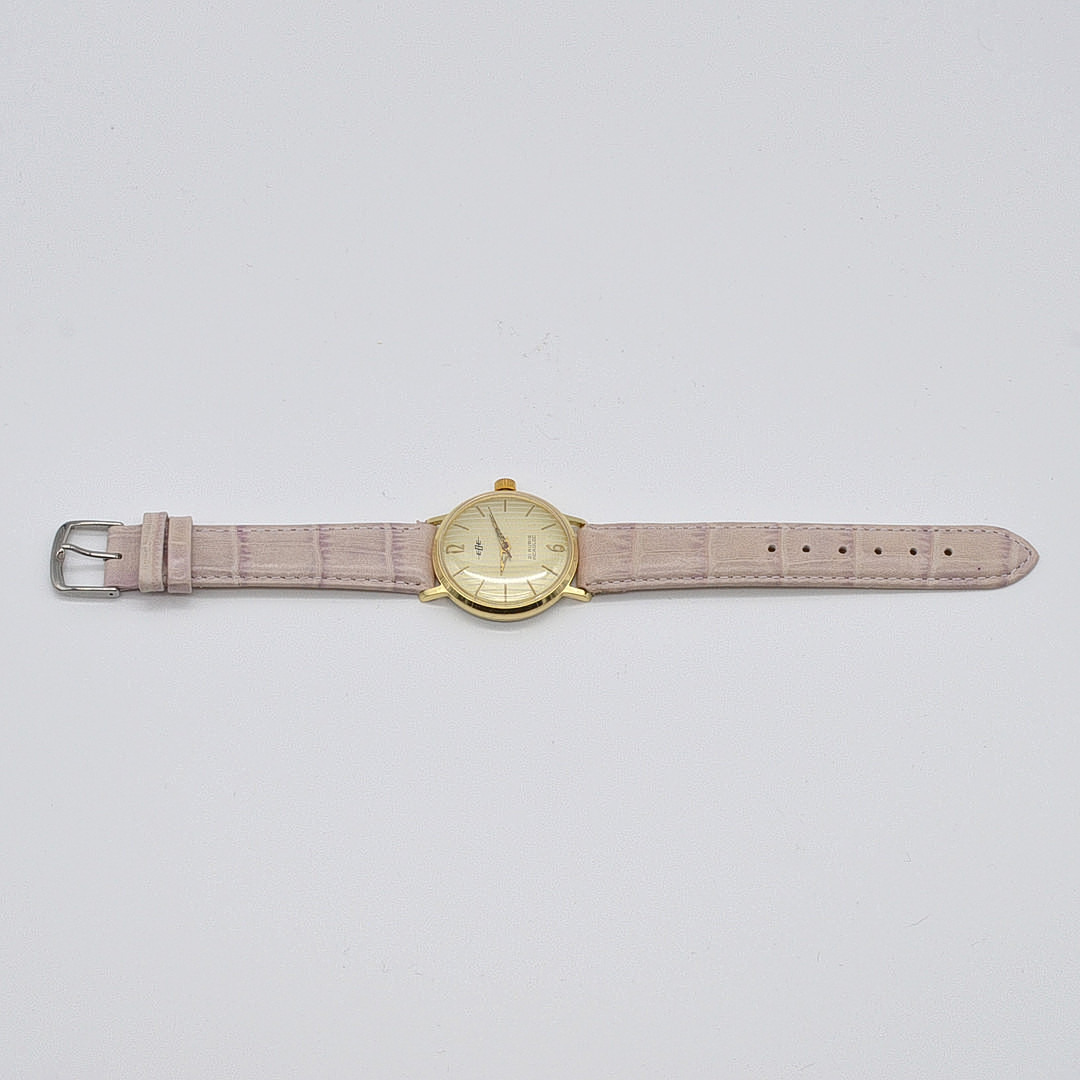 EGE ARMBANDUHR, 21 RUBIS INCABLOC, VERGOLDETES GEHÄUSE, LINIERTES ZIFFERBLATT, HANDAUFZUG, UM 1960ER JAHRE.