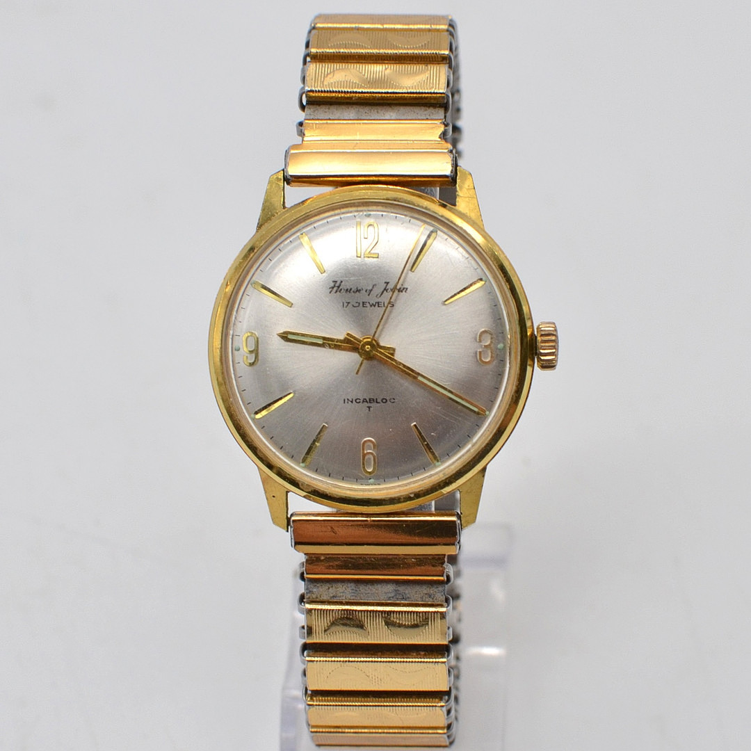 HOUSE OF JOBIN, ARMBANDUHR, 17 JEWELS, INCABLOC, VERGOLDETES GEHÄUSE, HANDAUFZUG, FLEXBAND MIT STRUKTUROBERFLÄCHE, SCHWEIZ, UM 1960.