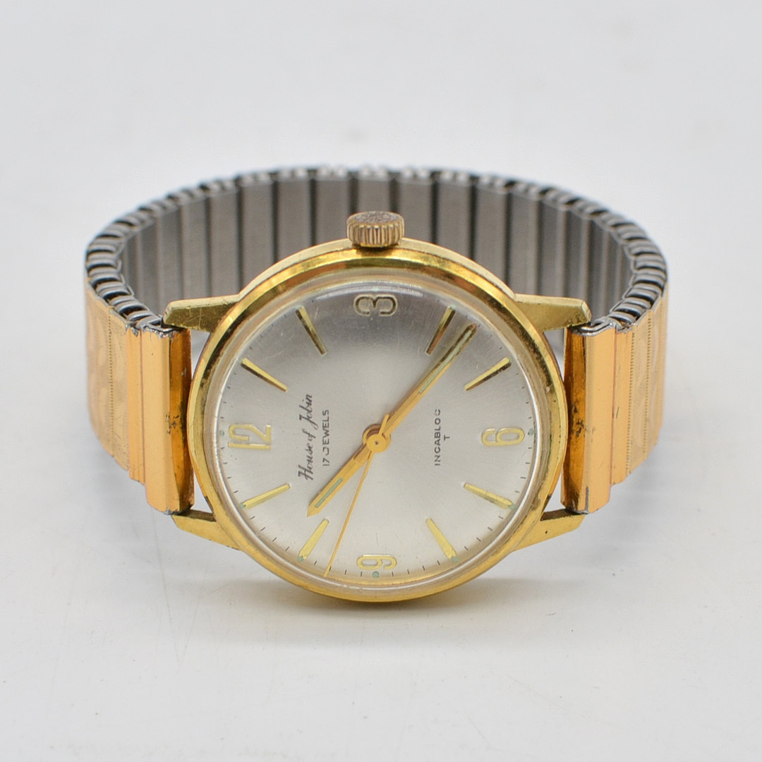 HOUSE OF JOBIN, ARMBANDUHR, 17 JEWELS, INCABLOC, VERGOLDETES GEHÄUSE, HANDAUFZUG, FLEXBAND MIT STRUKTUROBERFLÄCHE, SCHWEIZ, UM 1960.
