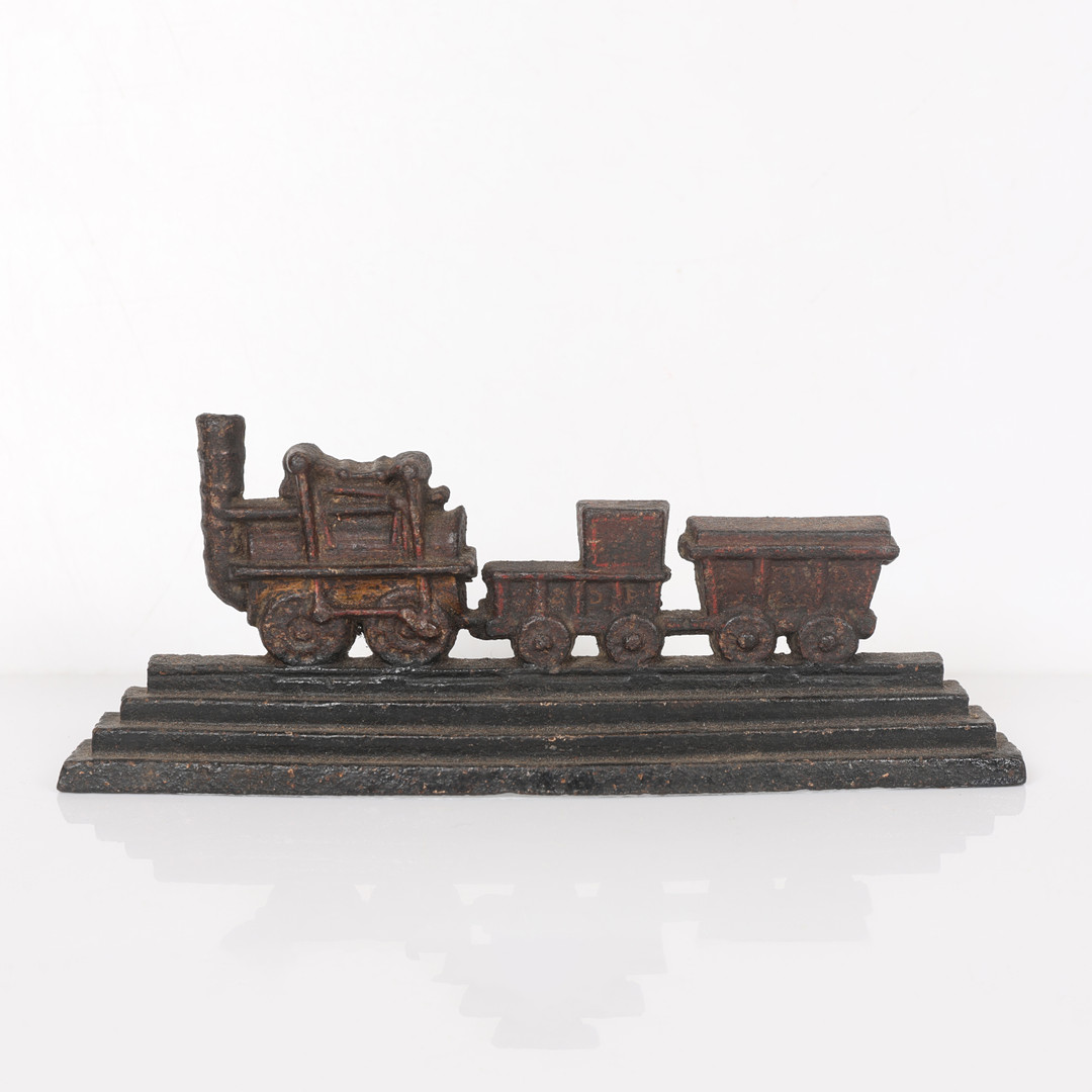 A 19TH CENTURY CAST IRON NOVELTY DOOR STOP.