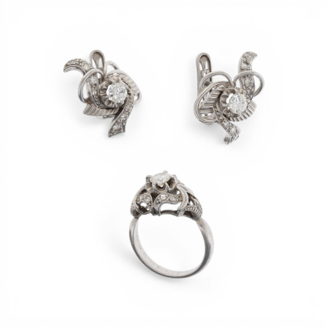 Diamonds ring and earring set, mid 20th Century.