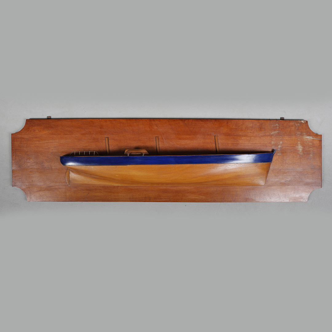 A 20TH CENTURY BOAT BUILDERS HALF BLOCK MODEL.