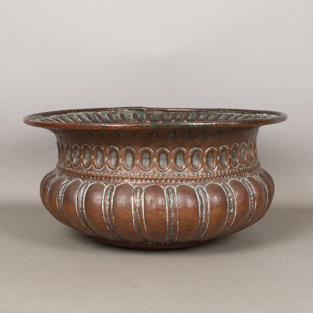 AN 18TH/19TH CENTURY INDIAN COPPER WINE CISTERN.