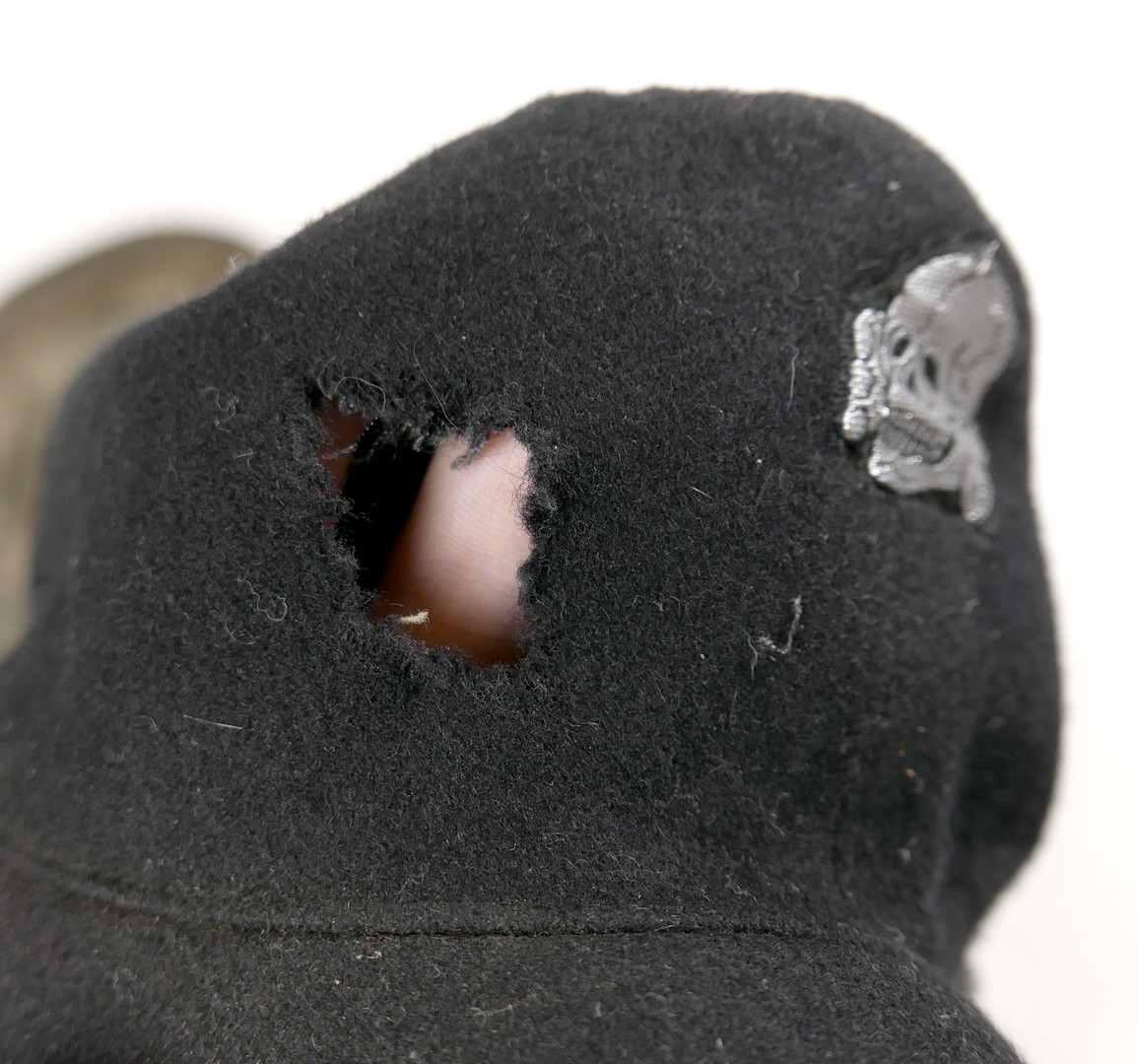 ONE US AND SIX GERMAN WORLD WAR II STYLE MILITARY CAPS.