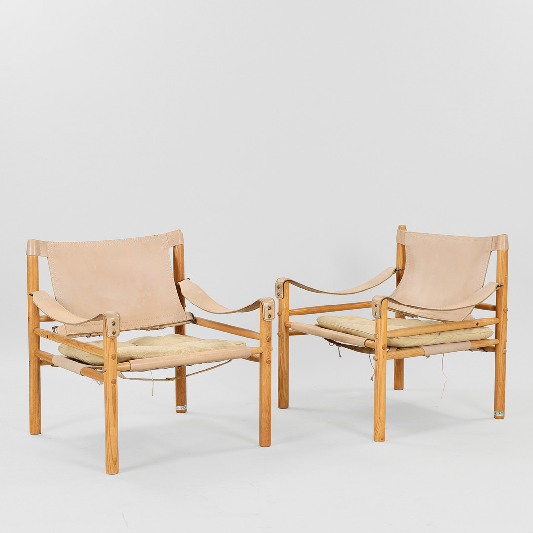 ARNE NORELL. "Sirocco", par lænestole med stel af ask, Norell Möbler, Sverige, formgivet 1964, (2).