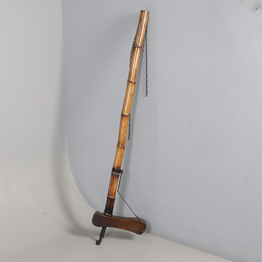 A JAPANESE STANDING HOOK JIZAIKAGI.