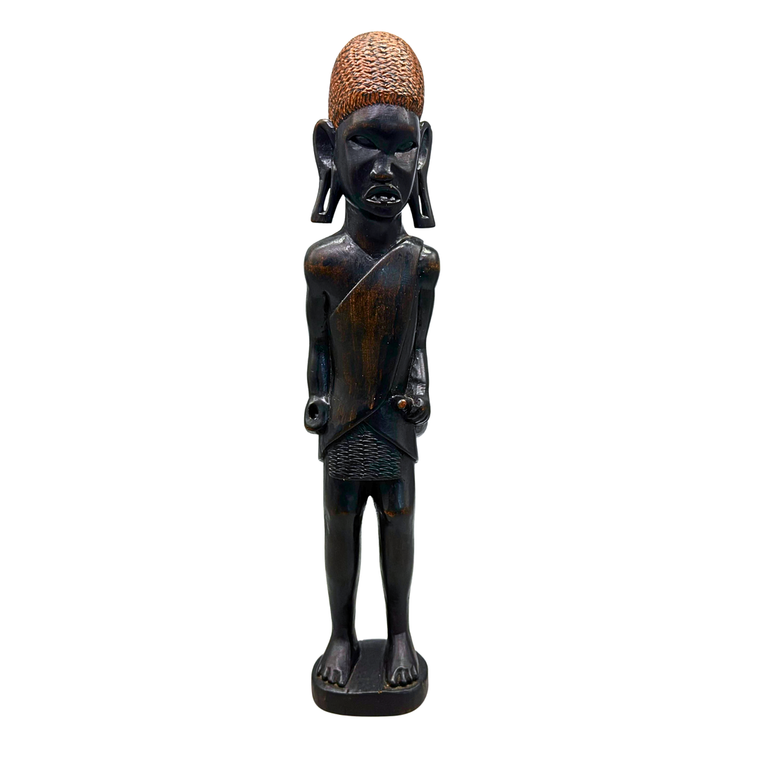 AFRIKANISCHE HOLZFIGUR EINES STAMMESKRIEGERS AUS GESCHWÄRZTEM HOLZ.