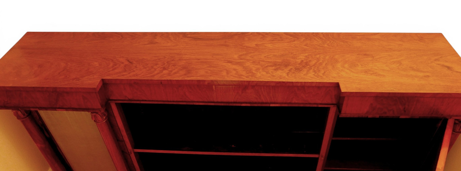 A WILLIAM IV ROSEWOOD INVERTED BREAKFRONT BOOKCASE.